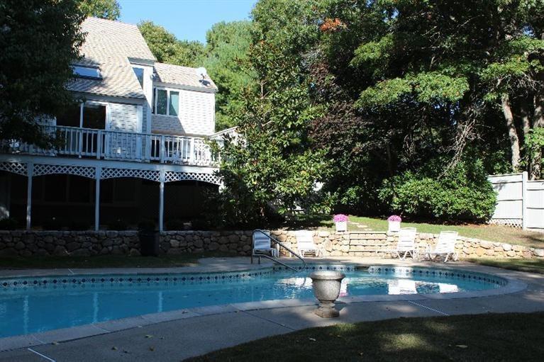 23 Tupelo Road Marstons Mills, MA 02648 - Photo 20 of 22 a view of a house with a yard