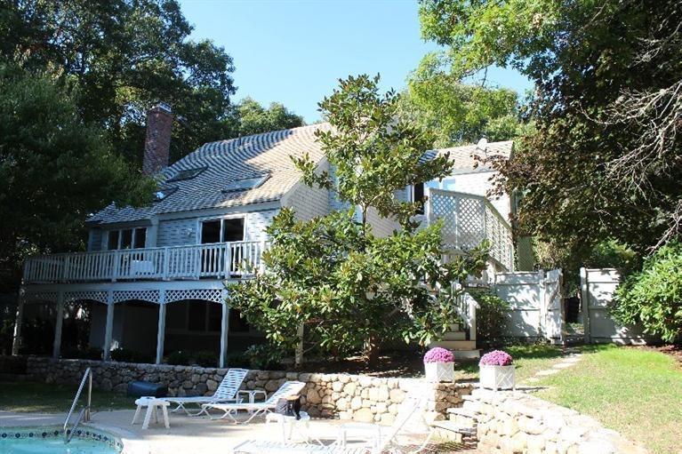 23 Tupelo Road Marstons Mills, MA 02648 - Photo 21 of 22 a front view of a house with a yard