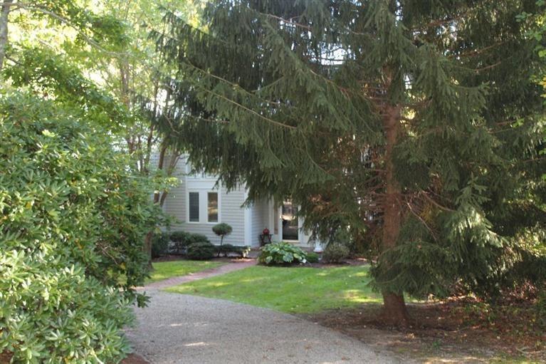 23 Tupelo Road Marstons Mills, MA 02648 - Photo 22 of 22 a front view of house with yard and green space