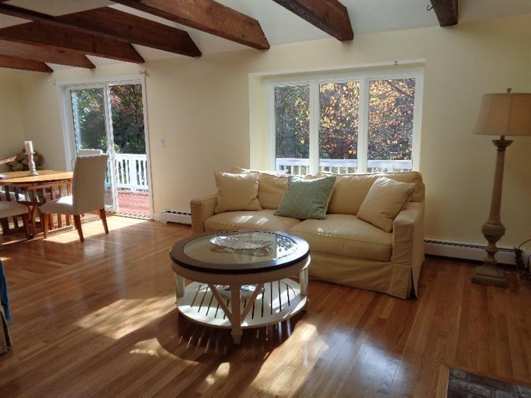 23 Tupelo Road Marstons Mills, MA 02648 - Photo 3 of 22 a living room with furniture and a large window