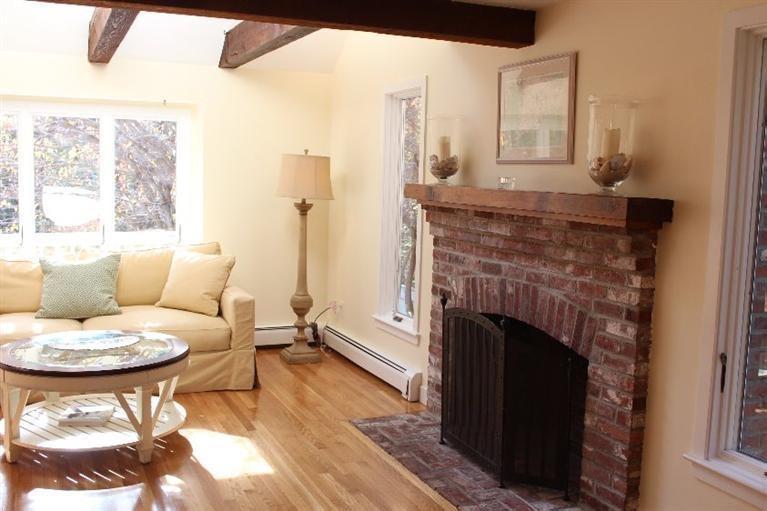23 Tupelo Road Marstons Mills, MA 02648 - Photo 5 of 22 a living room with furniture and a fireplace
