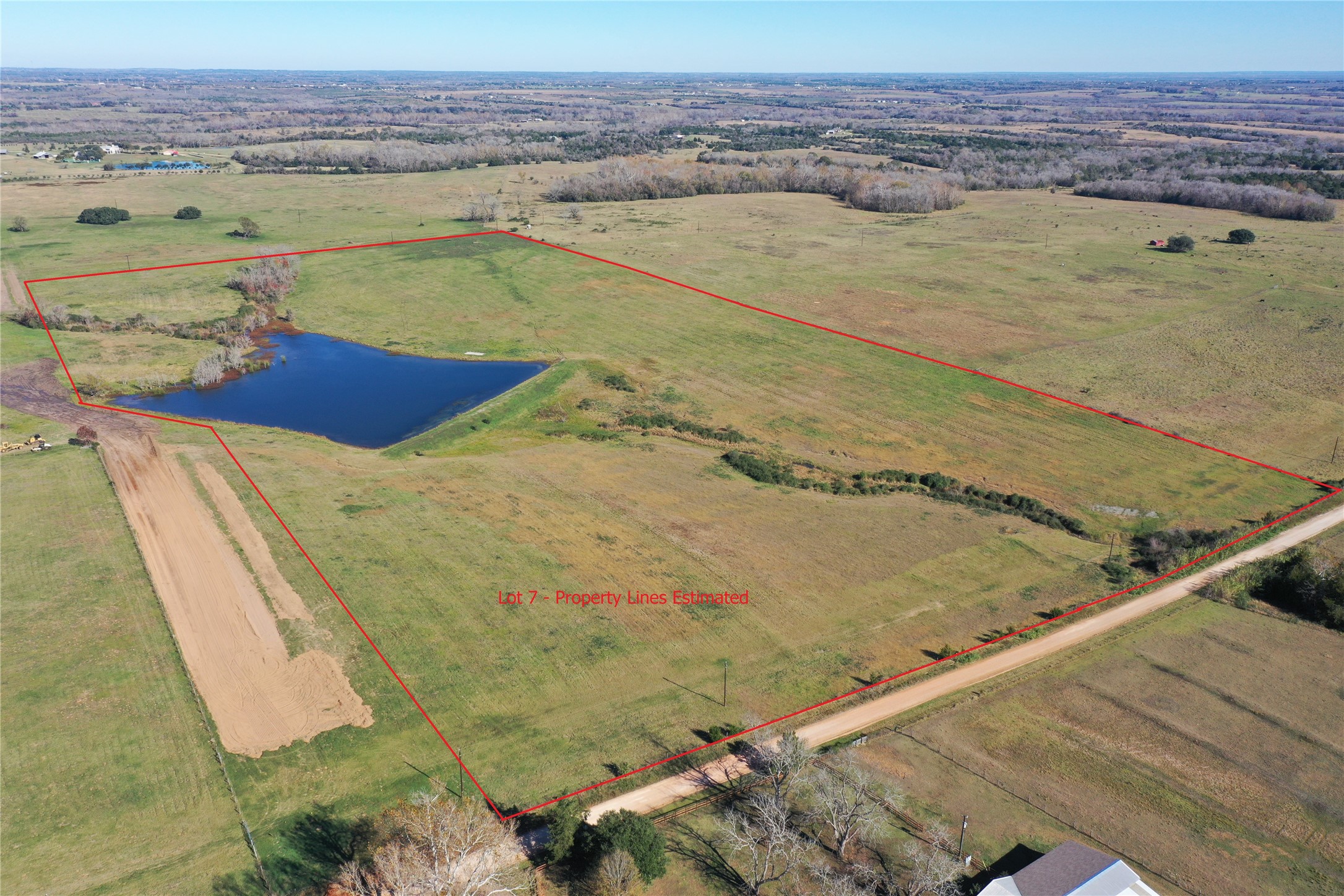 7 Pacen Place Chappell Hill, TX 77426 - Photo 7 of 8 a view of a swimming pool with a lake view