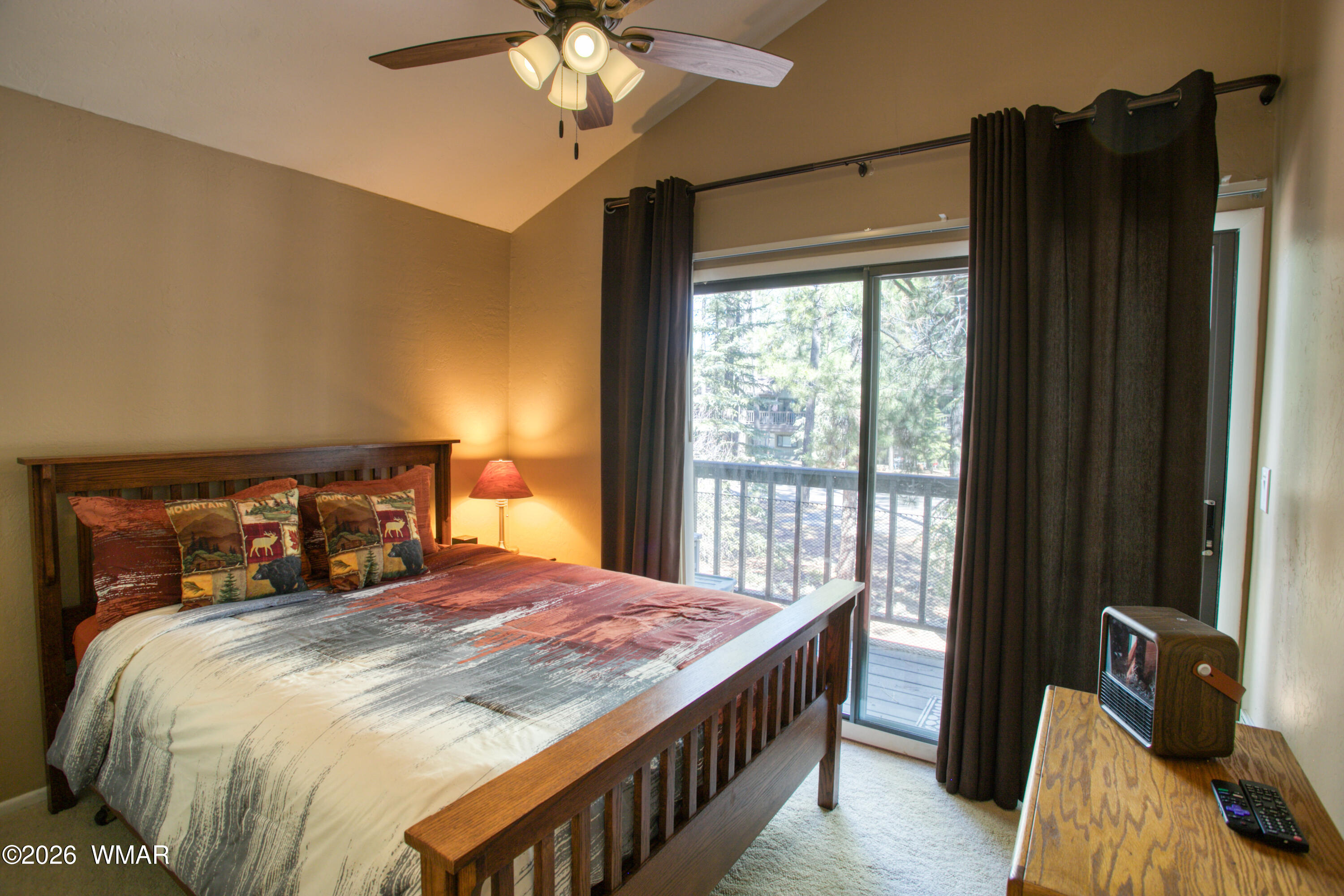 4568 Resort Loop, Unit 25A Pinetop, AZ 85935 - Photo 19 of 28 a bedroom with a bed and a window