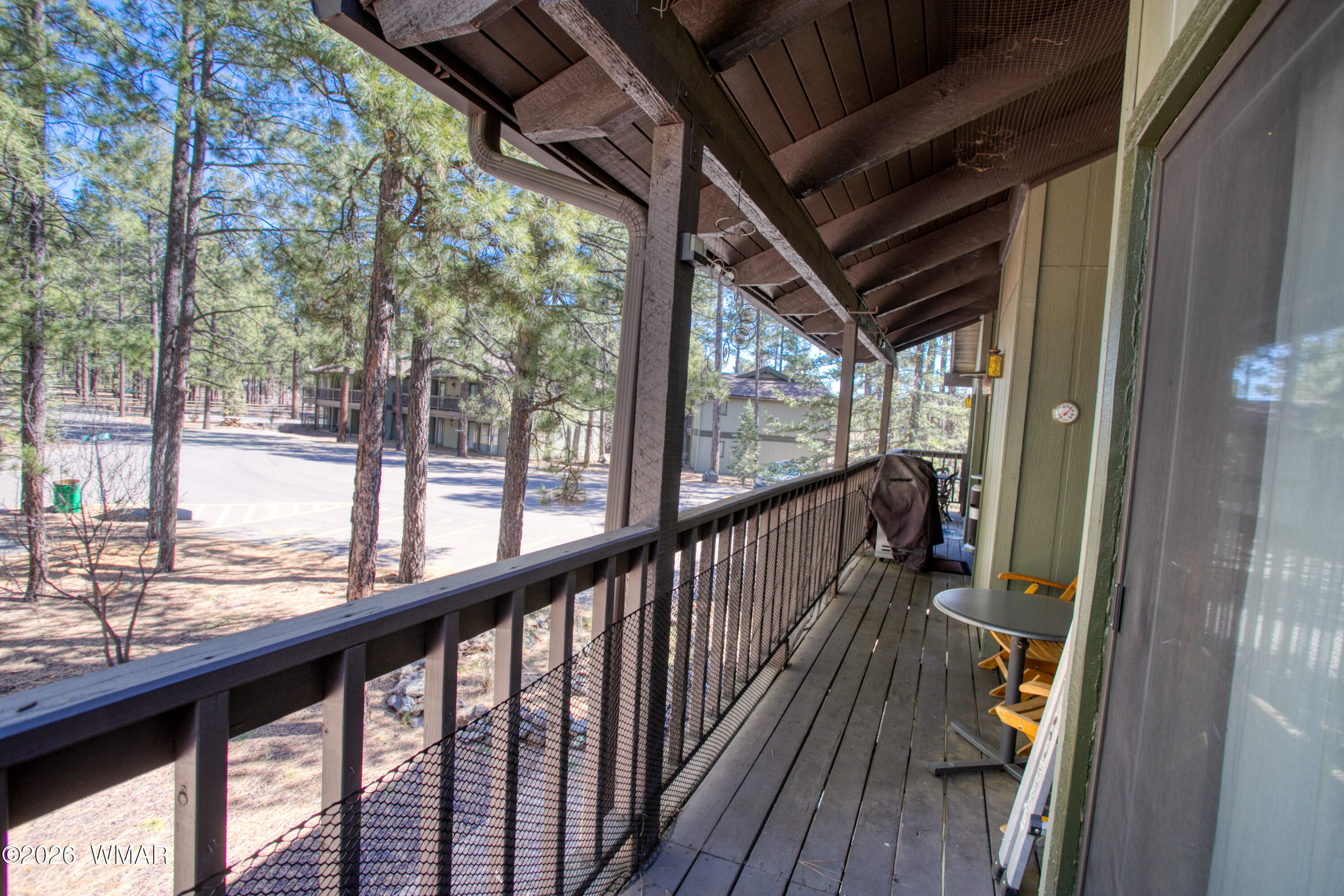 4568 Resort Loop, Unit 25A Pinetop, AZ 85935 - Photo 24 of 28 a view of balcony with wooden floor