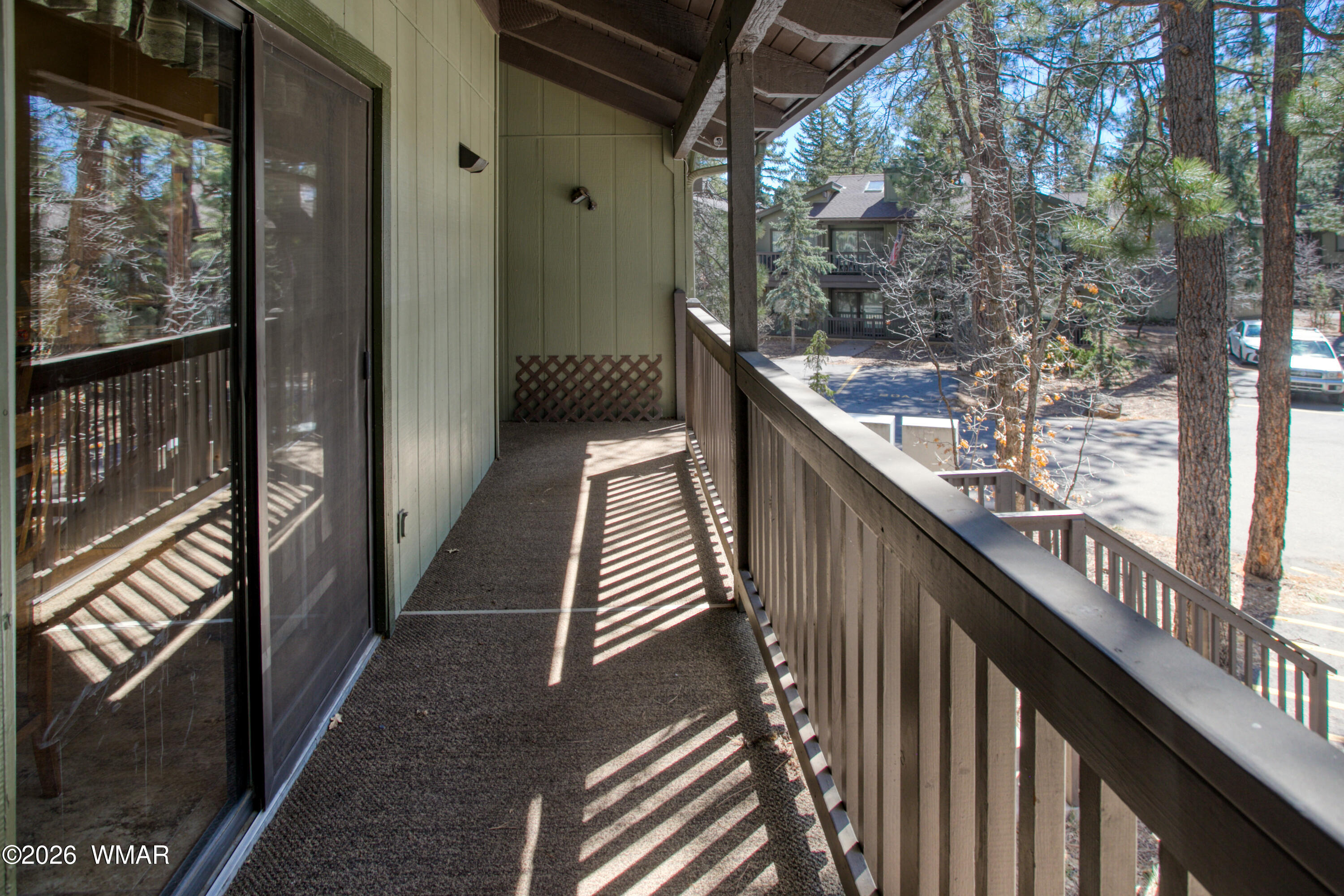 4568 Resort Loop, Unit 25A Pinetop, AZ 85935 - Photo 4 of 28 a view of balcony and wooden floor