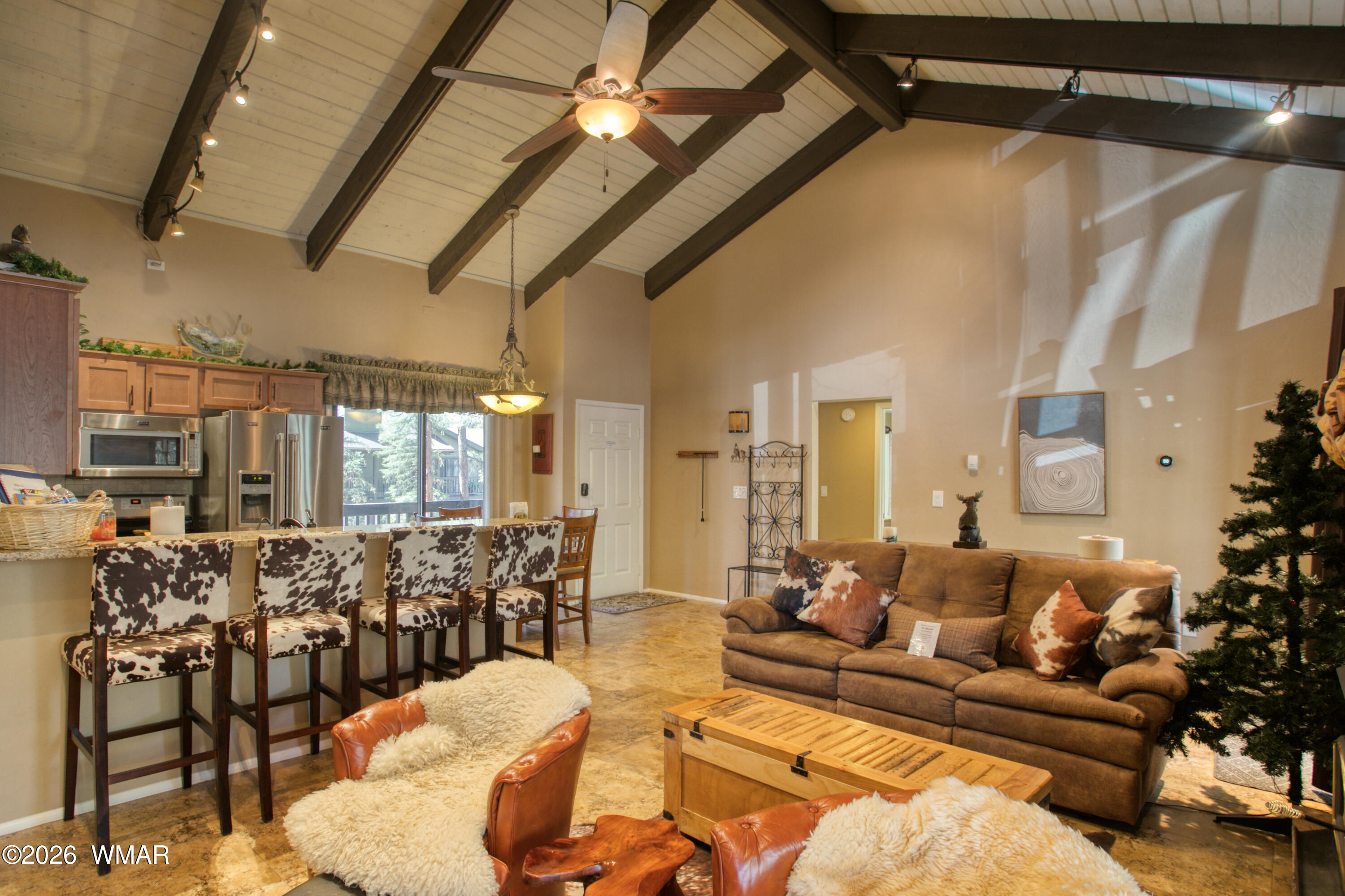 4568 Resort Loop, Unit 25A Pinetop, AZ 85935 - Photo 9 of 28 a living room with furniture and a large window