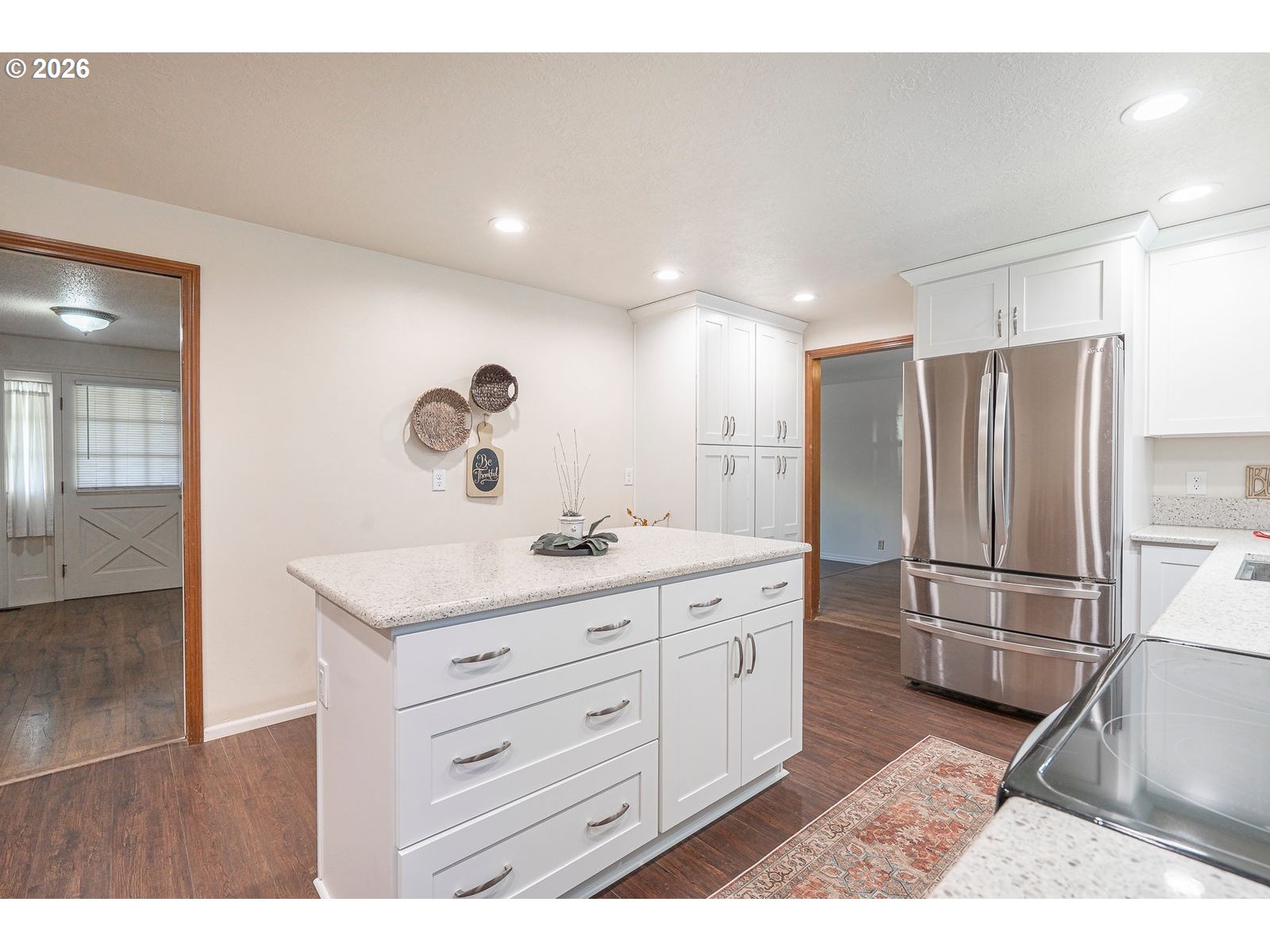 5356 Verda Lane Northeast Keizer, OR 97303 - Photo 13 of 41 a bathroom with a double vanity sink a mirror and a shower
