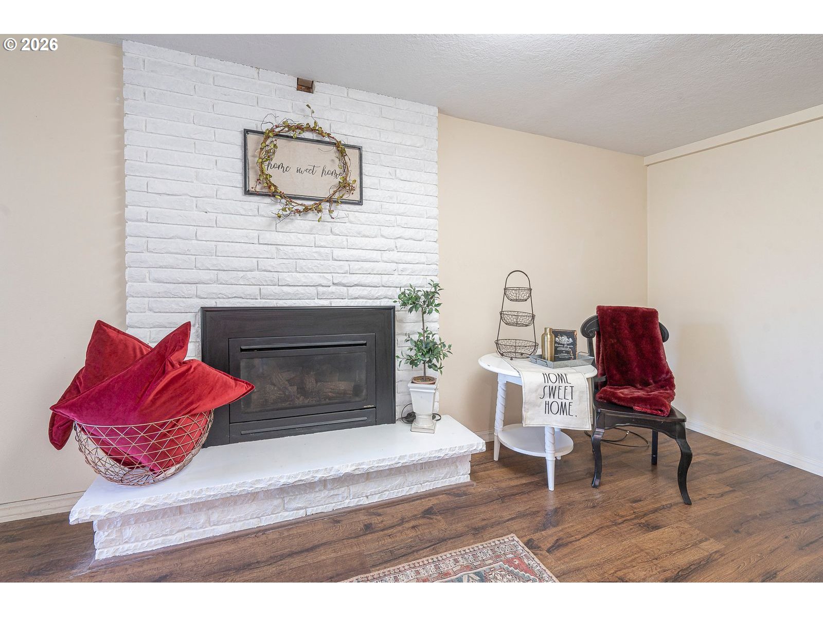 5356 Verda Lane Northeast Keizer, OR 97303 - Photo 16 of 41 a living room with furniture and a fireplace