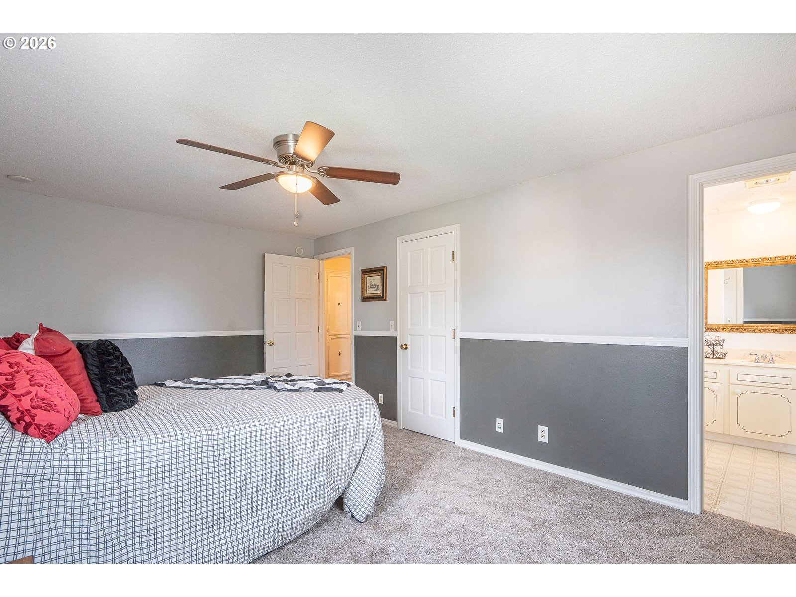 5356 Verda Lane Northeast Keizer, OR 97303 - Photo 24 of 41 a bedroom with a bed and a painting on the wall