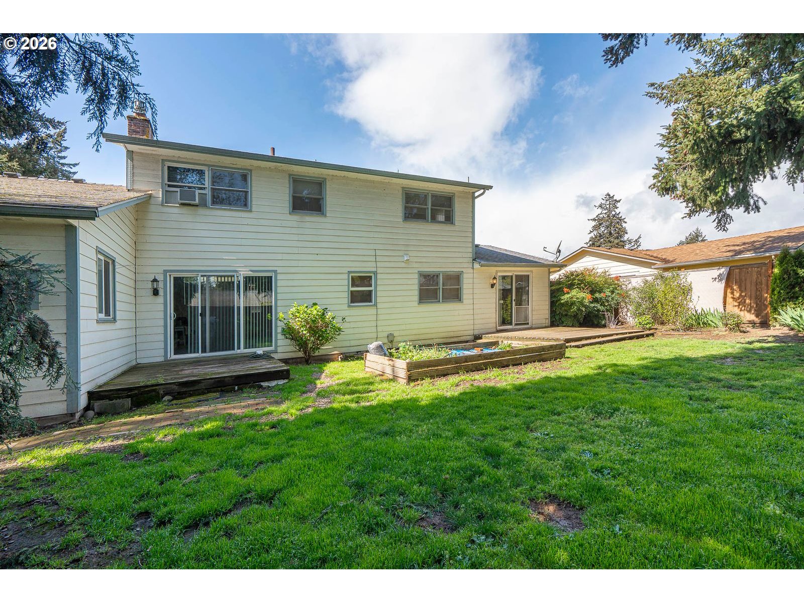 5356 Verda Lane Northeast Keizer, OR 97303 - Photo 37 of 41 a view of a house with a yard and sitting area