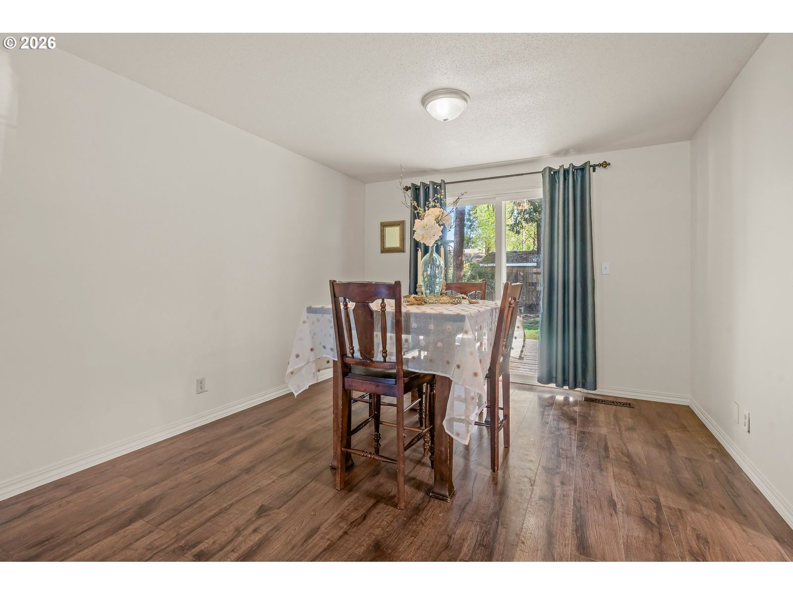 5356 Verda Lane Northeast Keizer, OR 97303 - Photo 8 of 41 a view of a dining room with furniture and a window