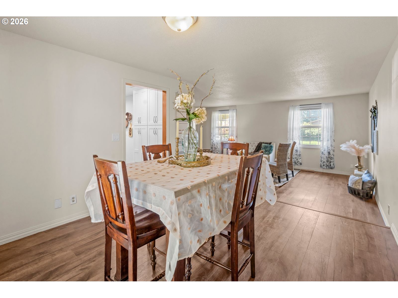 5356 Verda Lane Northeast Keizer, OR 97303 - Photo 9 of 41 a view of a dining room with furniture and wooden floor