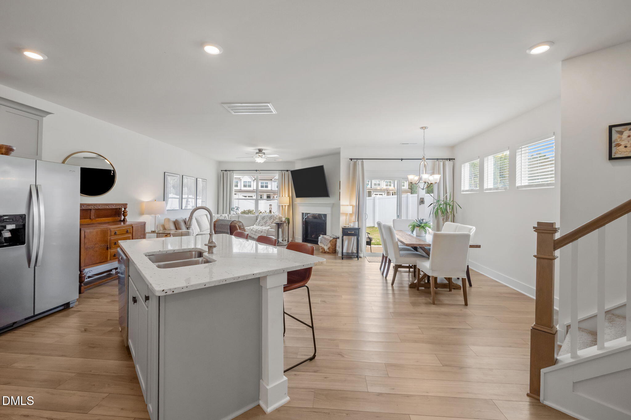 1000 Heartstone Way Durham, NC 27713 - Photo 11 of 43 a dining hall with stainless steel appliances granite countertop a table and chairs