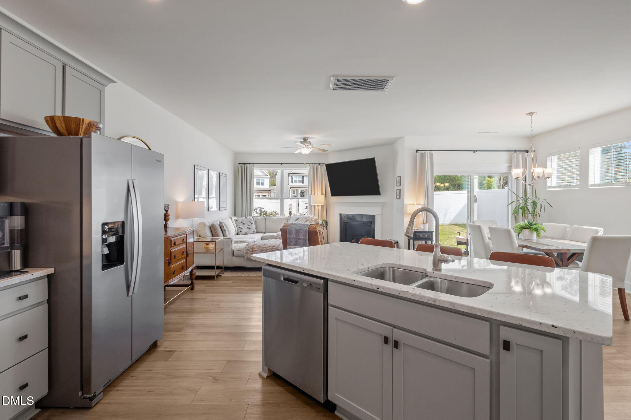 1000 Heartstone Way Durham, NC 27713 - Photo 12 of 43 a kitchen with sink refrigerator and window