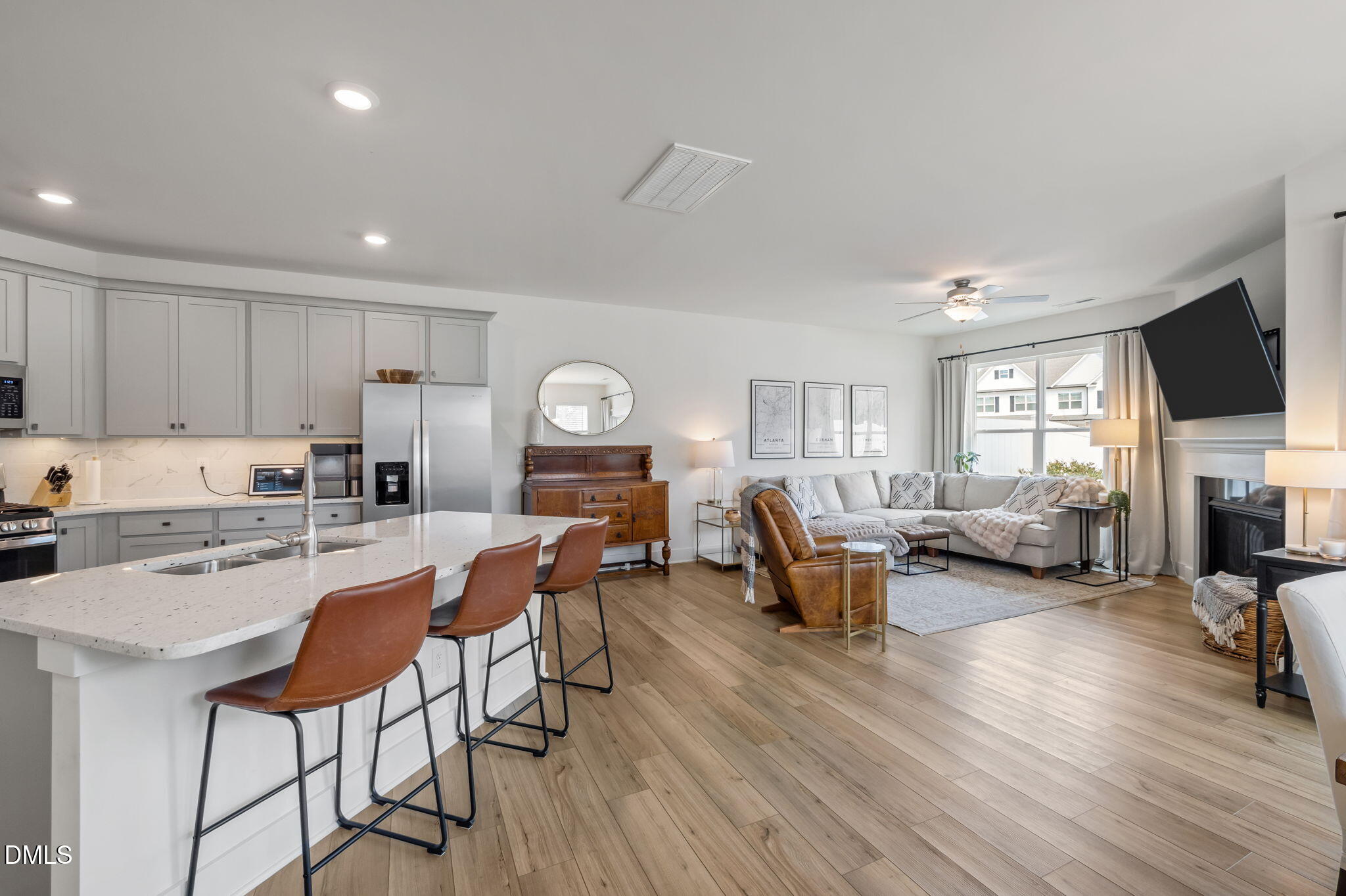 1000 Heartstone Way Durham, NC 27713 - Photo 14 of 43 a living room with furniture and a wooden floor