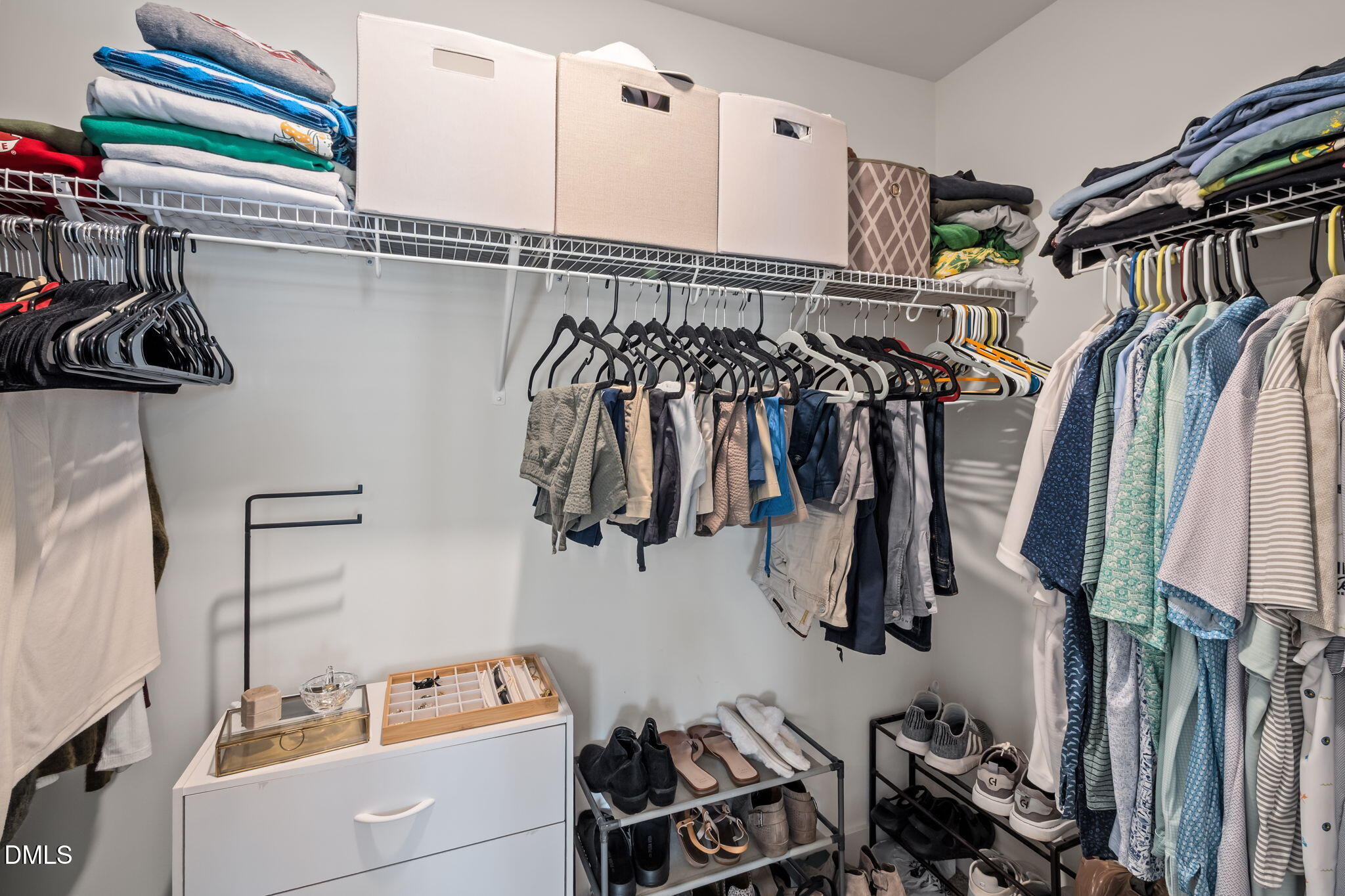1000 Heartstone Way Durham, NC 27713 - Photo 18 of 43 a view of walk in closet with clothes and shoes