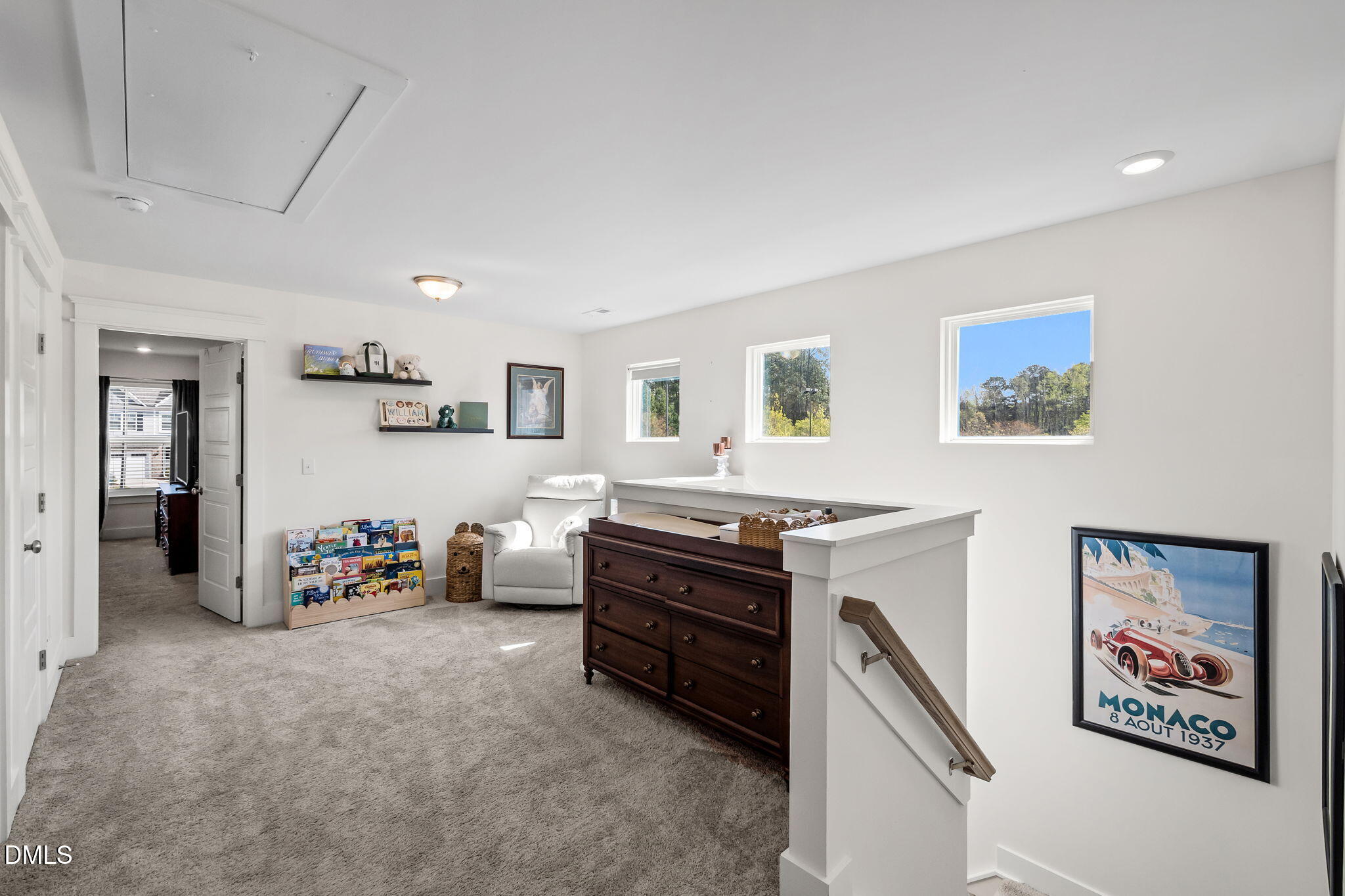 1000 Heartstone Way Durham, NC 27713 - Photo 25 of 43 a living room with furniture and a baby crib