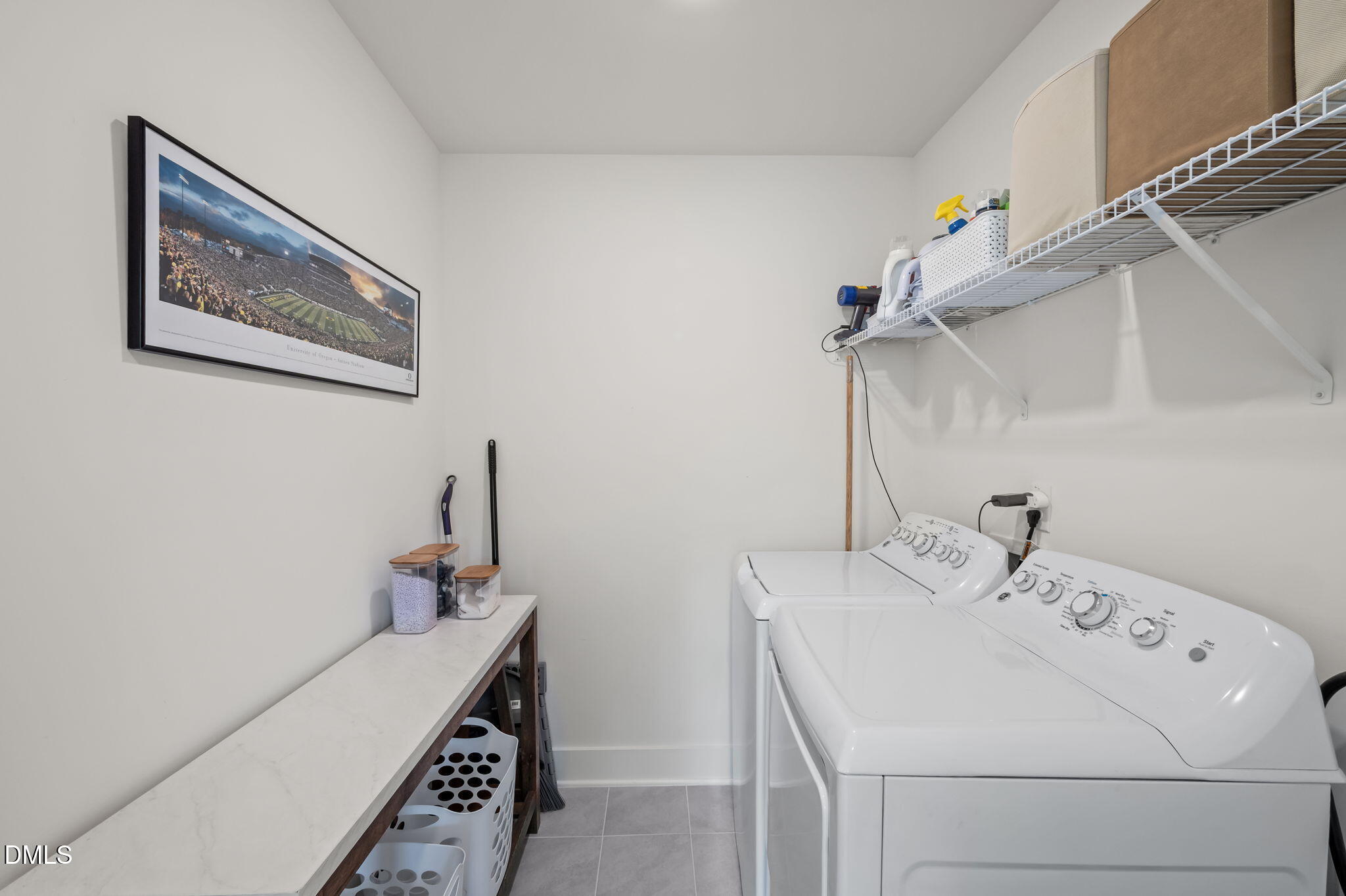 1000 Heartstone Way Durham, NC 27713 - Photo 28 of 43 a bathroom with a sink and a mirror