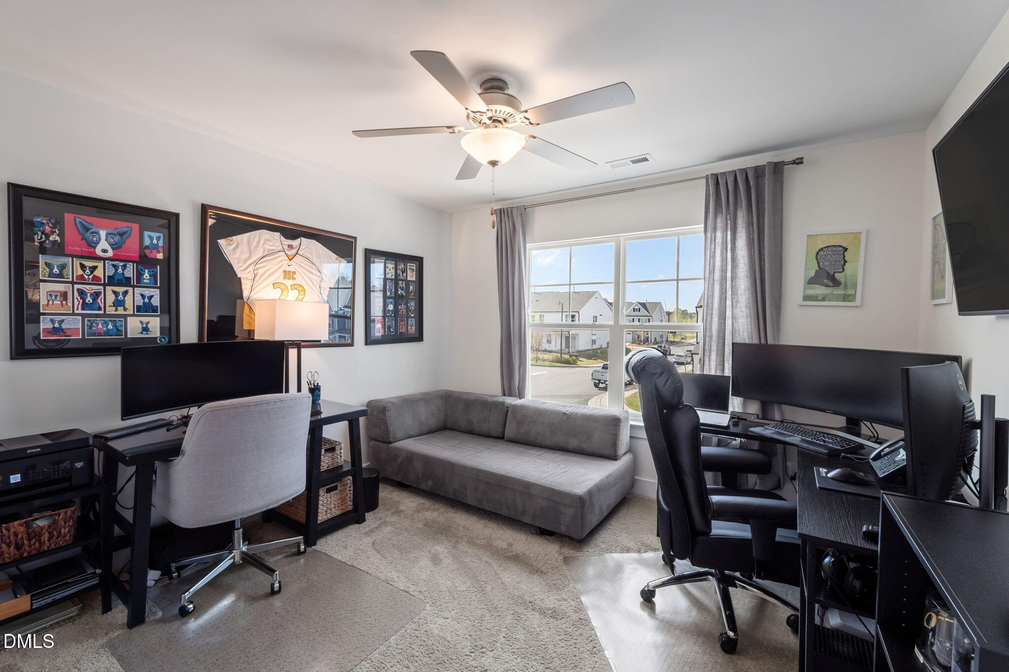1000 Heartstone Way Durham, NC 27713 - Photo 31 of 43 a living room with furniture a chandelier and a window