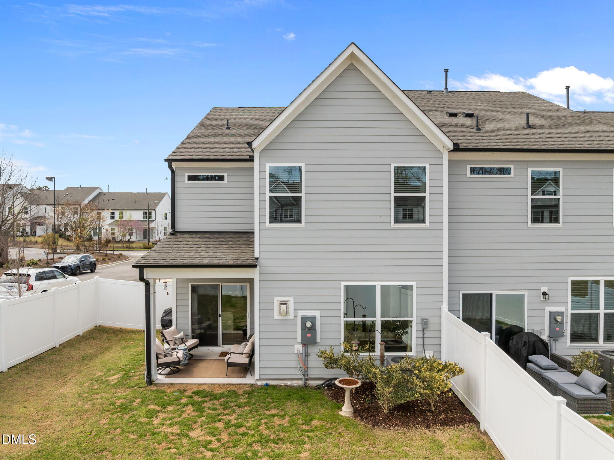 1000 Heartstone Way Durham, NC 27713 - Photo 37 of 43 a view of a house with backyard outdoor seating area