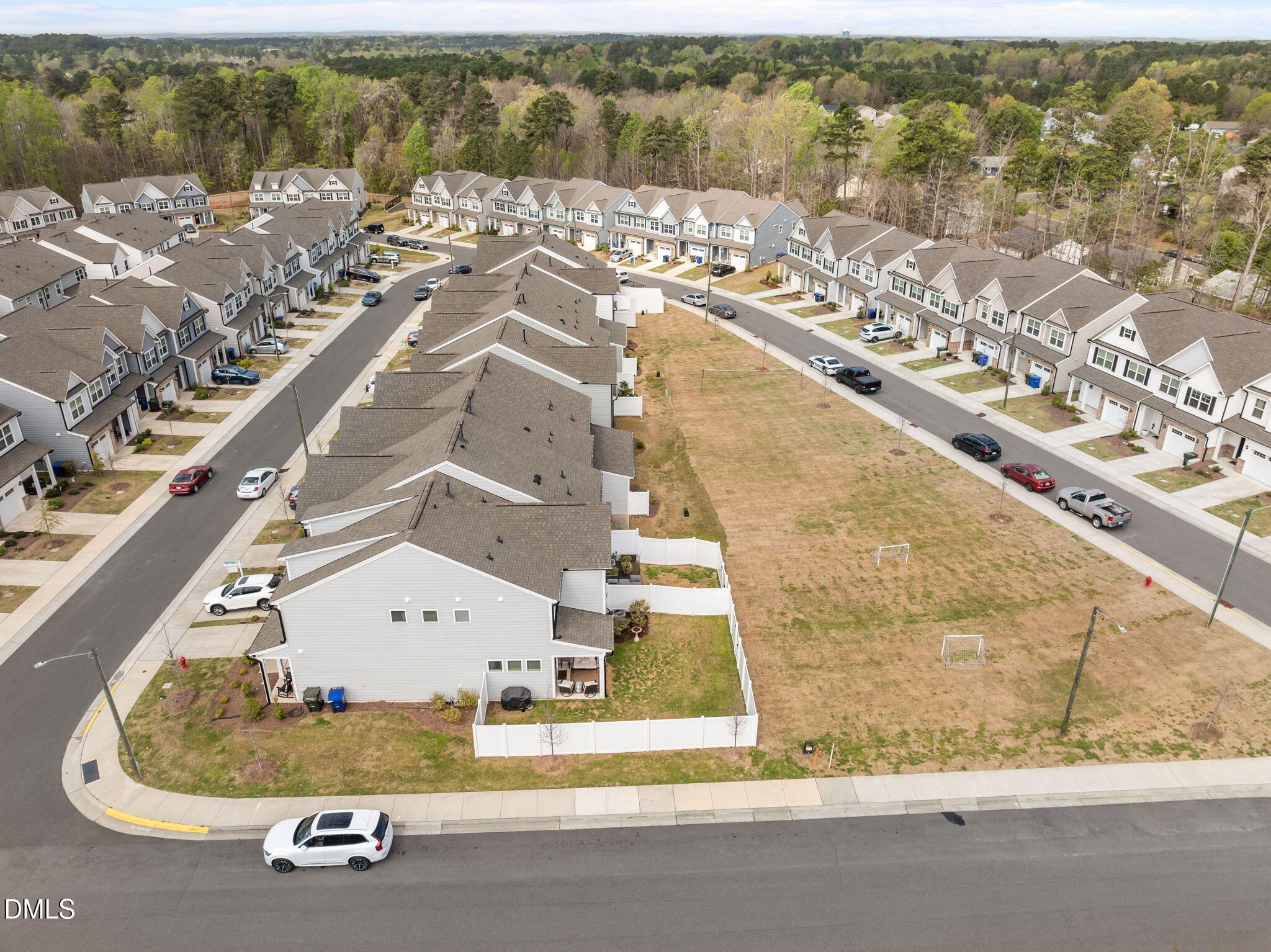 1000 Heartstone Way Durham, NC 27713 - Photo 41 of 43 an aerial view of residential houses with outdoor space