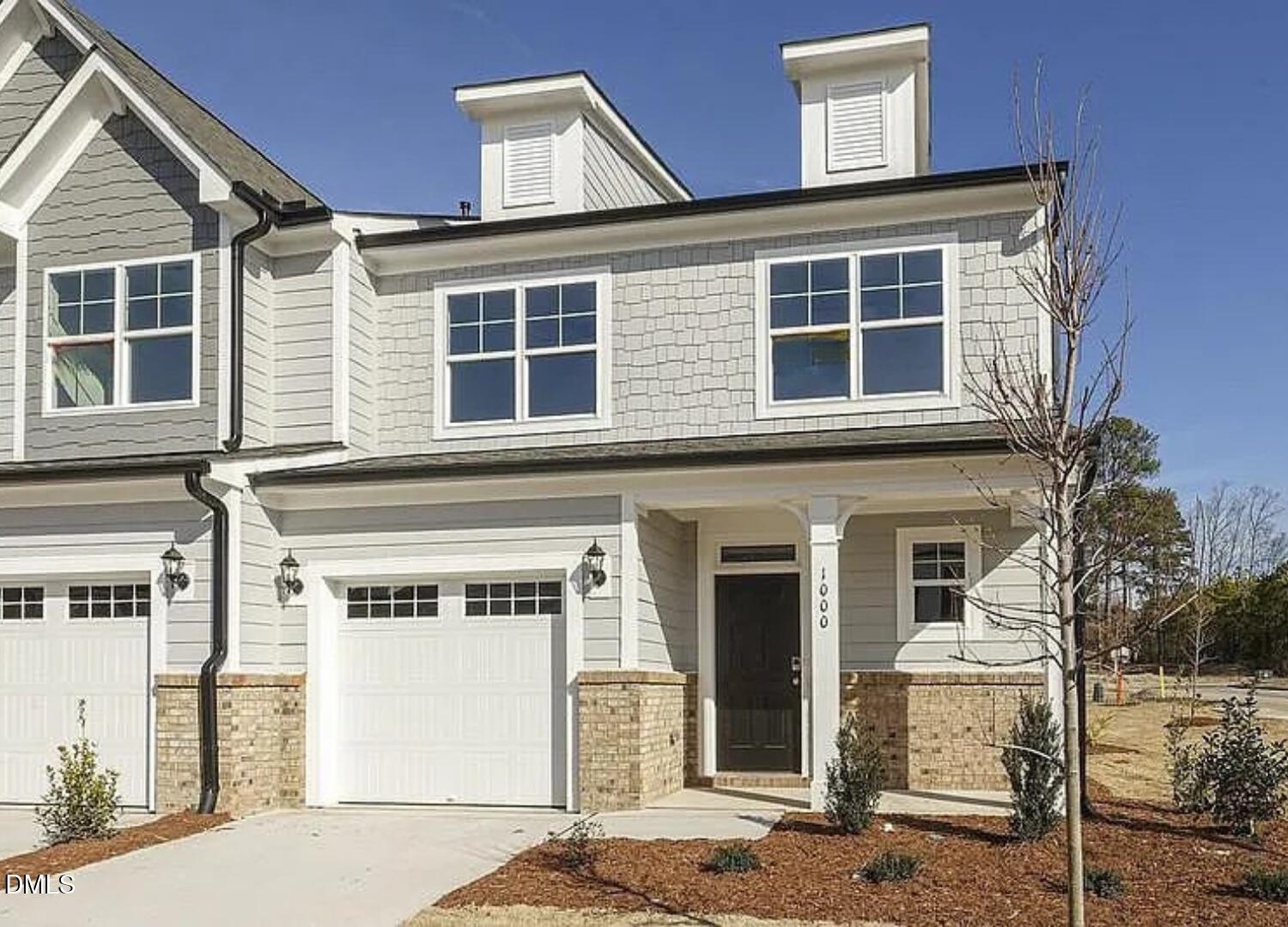 1000 Heartstone Way Durham, NC 27713 - Photo 43 of 43 a front view of a house with a street