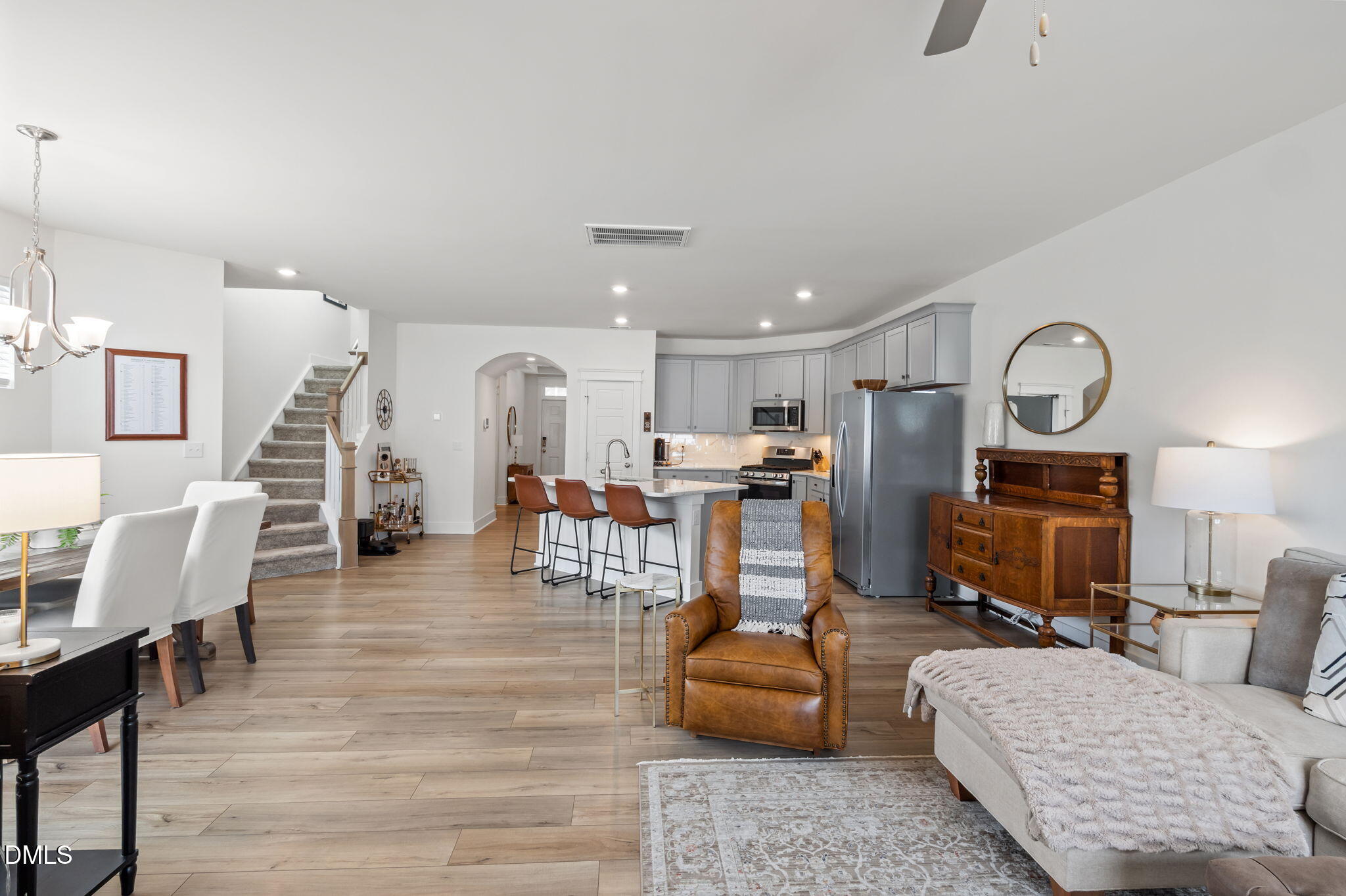 1000 Heartstone Way Durham, NC 27713 - Photo 6 of 43 a living room with furniture and wooden floor