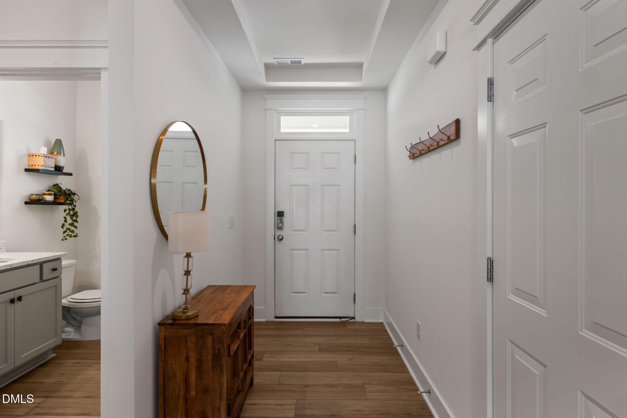 1000 Heartstone Way Durham, NC 27713 - Photo 8 of 43 a view of a livingroom with furniture and wooden floor