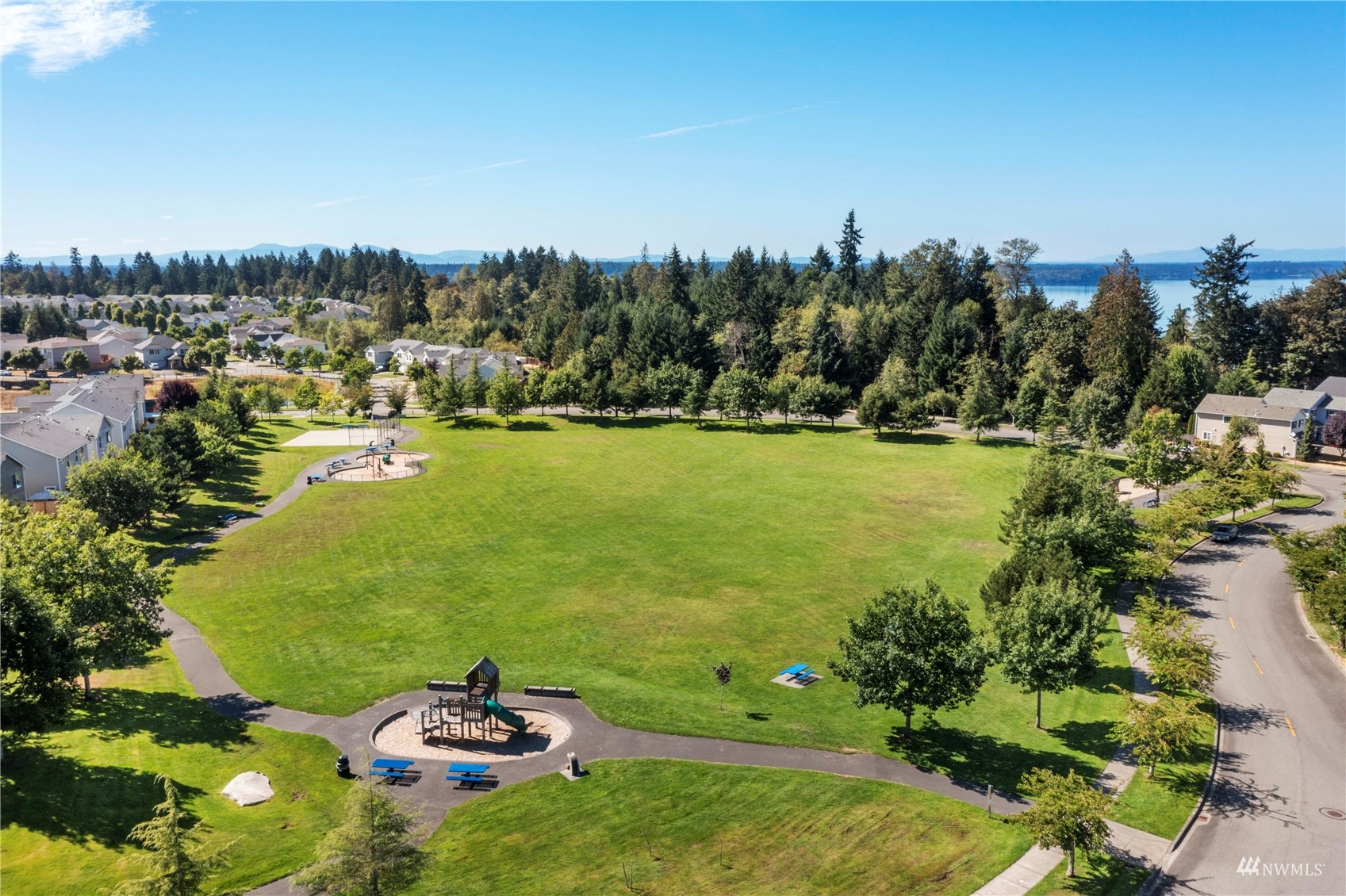3118 Walker Road DuPont, WA 98327 - Photo 32 of 33 a view of a lake with a city