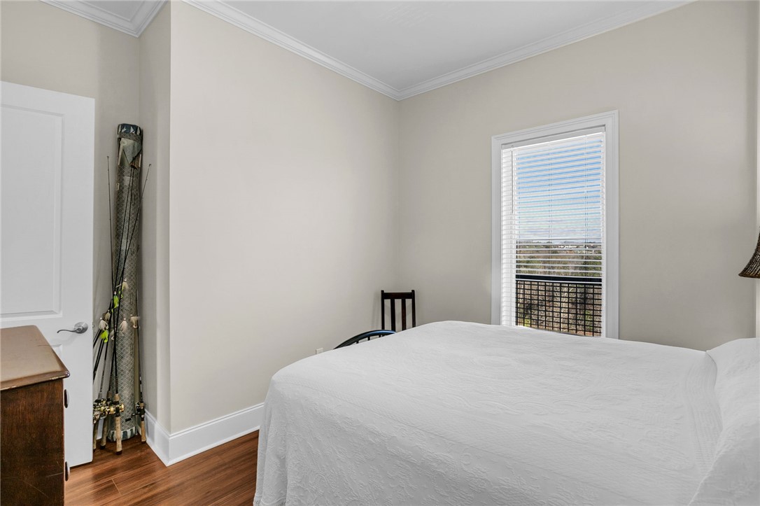 703 Watermarke Lane Anderson, SC 29625 - Photo 6 of 49 This serene bedroom offers ample light and comfortable flooring for peaceful living.
