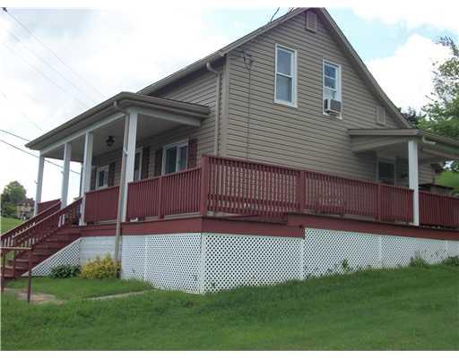 112 Carmichaels Street Rices Landing, PA 15357 - Photo 3 of 15 Patio/Deck. WRAP AROUND DECK WITH SERENE VIEW OF MON RIVER