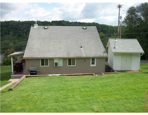 112 Carmichaels Street Rices Landing, PA 15357 - Photo 4 of 15 Exterior Back. INCLUDES SHED WITH DUSK TO DAWN LIGHT & ELECTRIC INSIDE