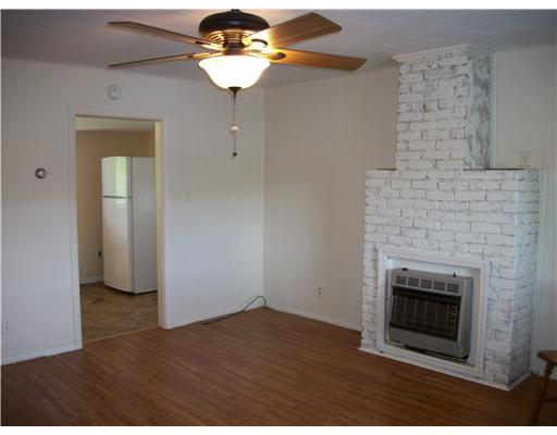 112 Carmichaels Street Rices Landing, PA 15357 - Photo 7 of 15 Living Room. LARGE LIVING ROOM WITH GAS FP