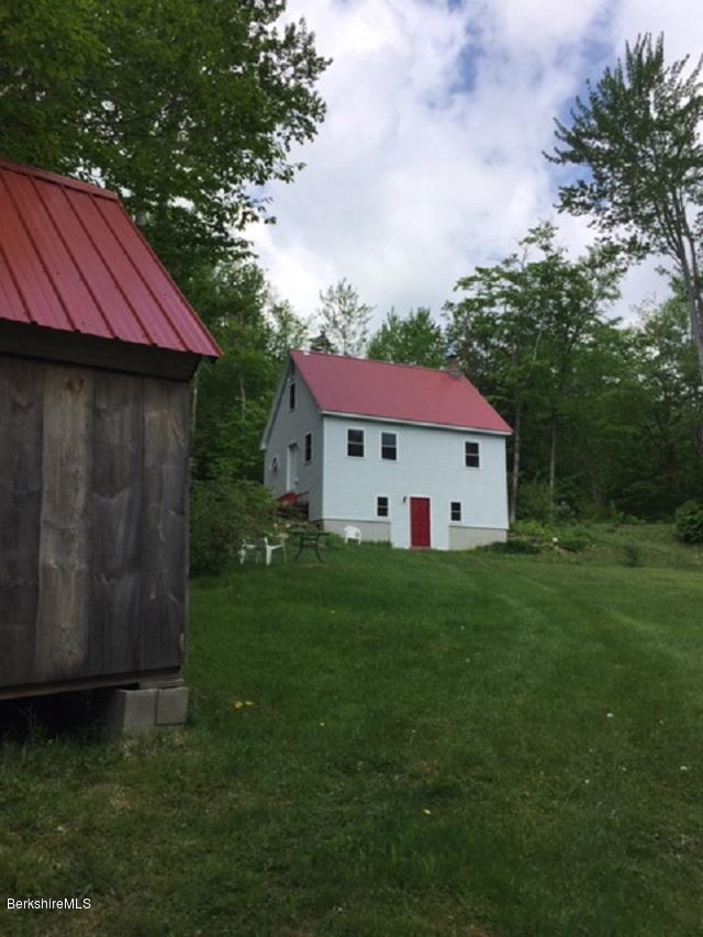 2810 Howe Pond Road Readsboro, VT 05350 - Photo 11 of 29 a view of a house with a yard