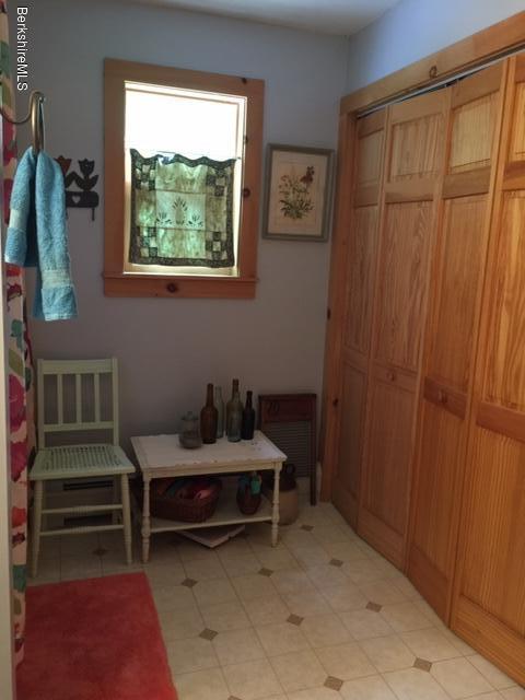 2810 Howe Pond Road Readsboro, VT 05350 - Photo 17 of 29 a room with furniture and a window