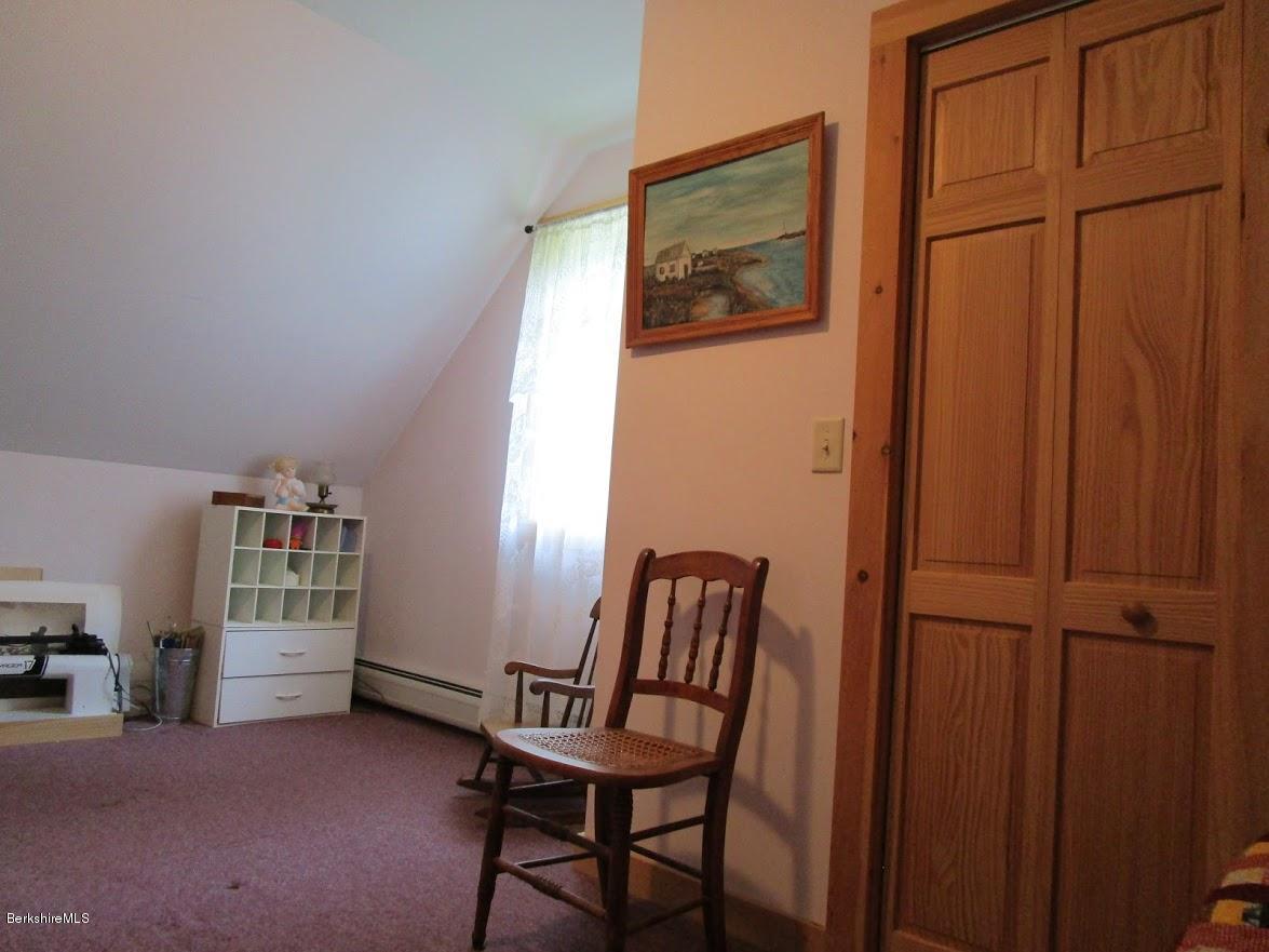 2810 Howe Pond Road Readsboro, VT 05350 - Photo 29 of 29 a view of a hallway with workspace and a window