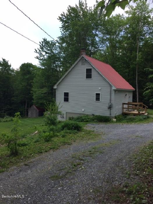 2810 Howe Pond Road Readsboro, VT 05350 - Photo 4 of 29 a view of a house with a yard