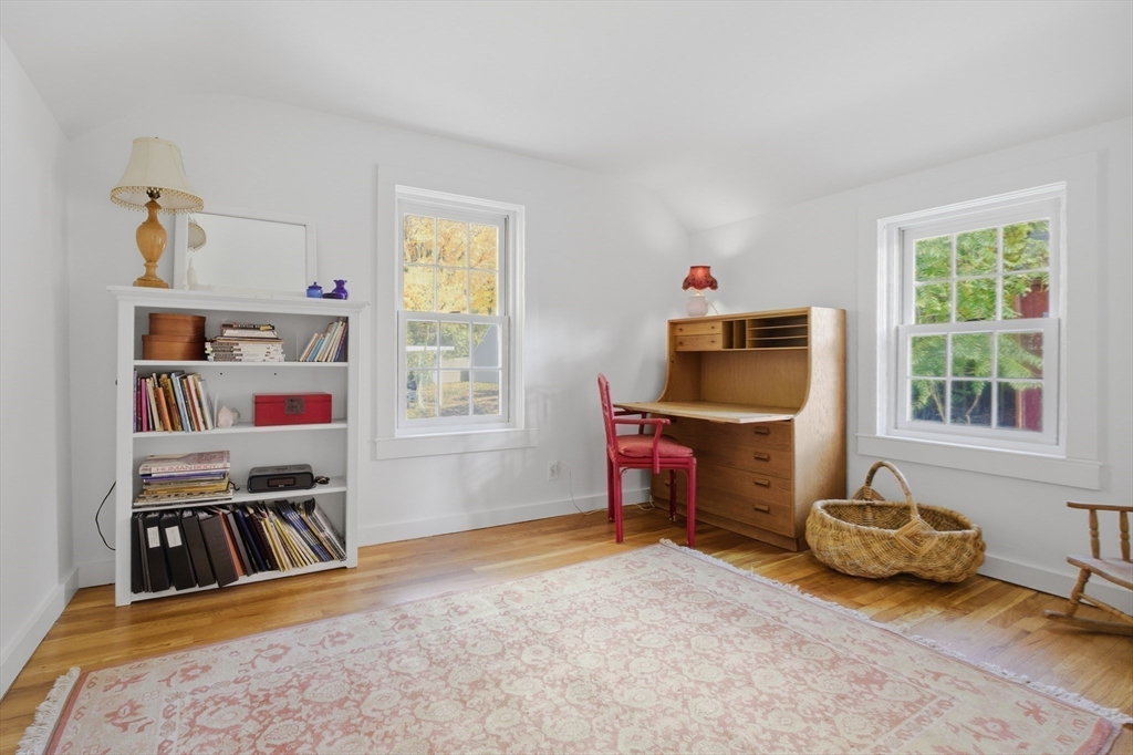 36 Concord Road Sudbury, MA 01776 - Photo 15 of 30 a bedroom with furniture and a window