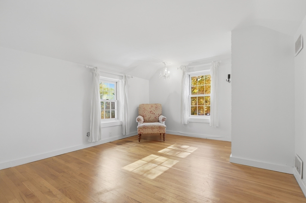 36 Concord Road Sudbury, MA 01776 - Photo 16 of 30 a living room with furniture and a window