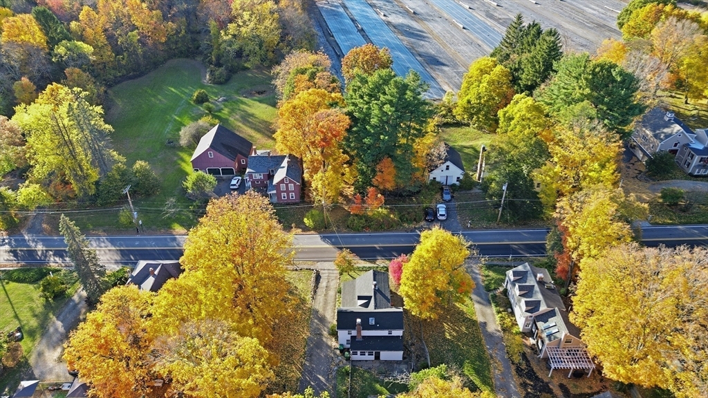 36 Concord Road Sudbury, MA 01776 - Photo 29 of 30 a front view of a house with swimming pool and porch