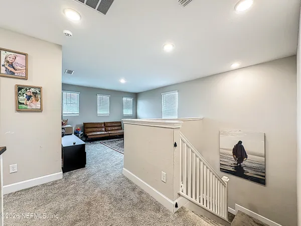 a living room with furniture and a couch