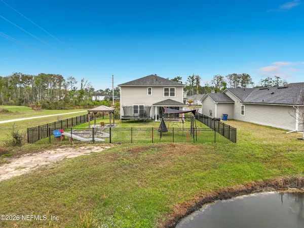 a view of swimming pool with lounge chair