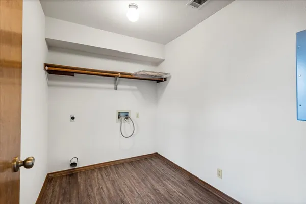 a view of a room with rack on the wall