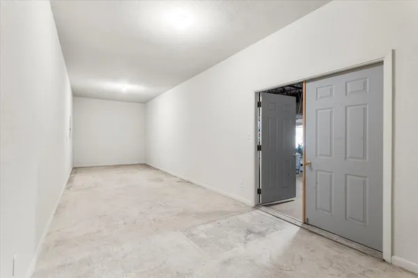 an empty room with a natural light