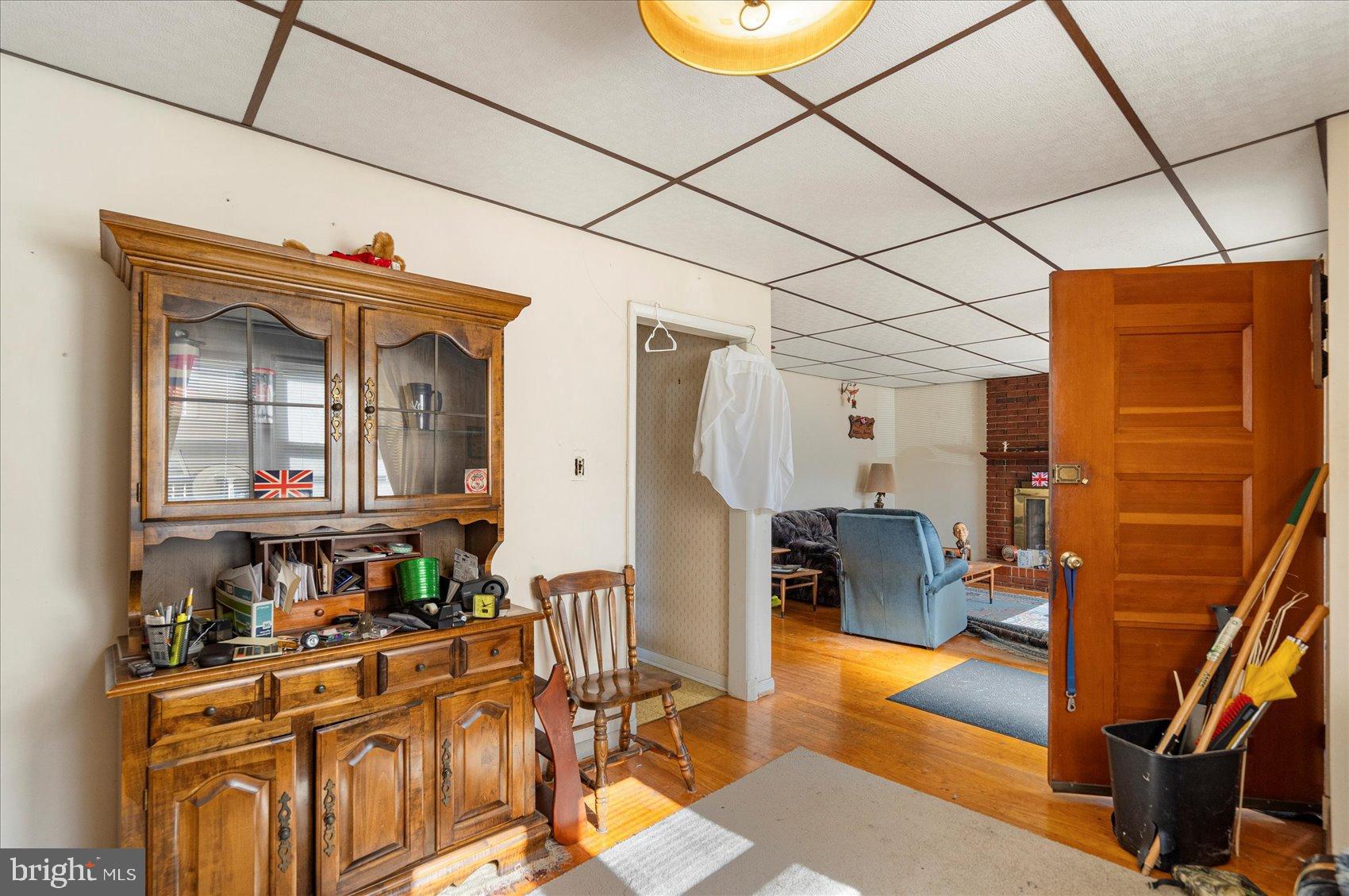 8368 Old Philadelphia Road Baltimore, MD 21237 - Photo 13 of 29 a view of a kitchen with furniture and a window