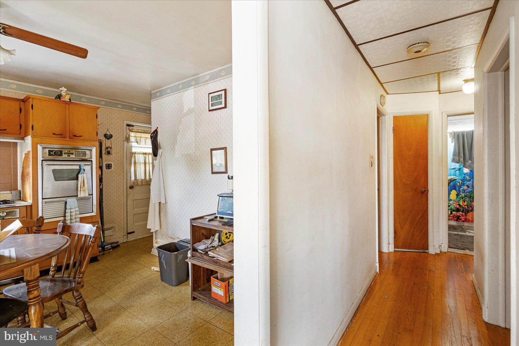 8368 Old Philadelphia Road Baltimore, MD 21237 - Photo 14 of 29 a view of a livingroom with furniture and front door