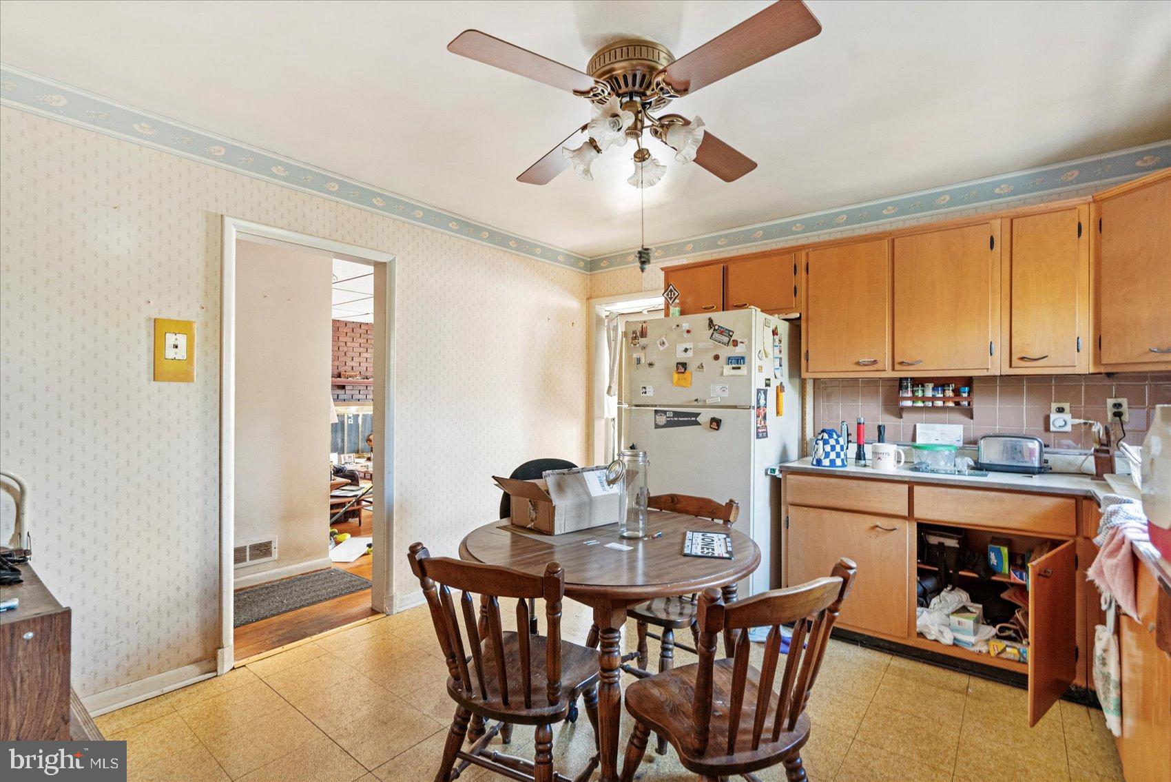 8368 Old Philadelphia Road Baltimore, MD 21237 - Photo 17 of 29 a view of a dining room with furniture window and outside view