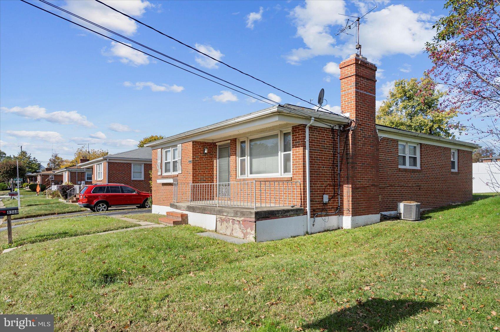 8368 Old Philadelphia Road Baltimore, MD 21237 - Photo 2 of 29 a view of a house with a yard and sitting area