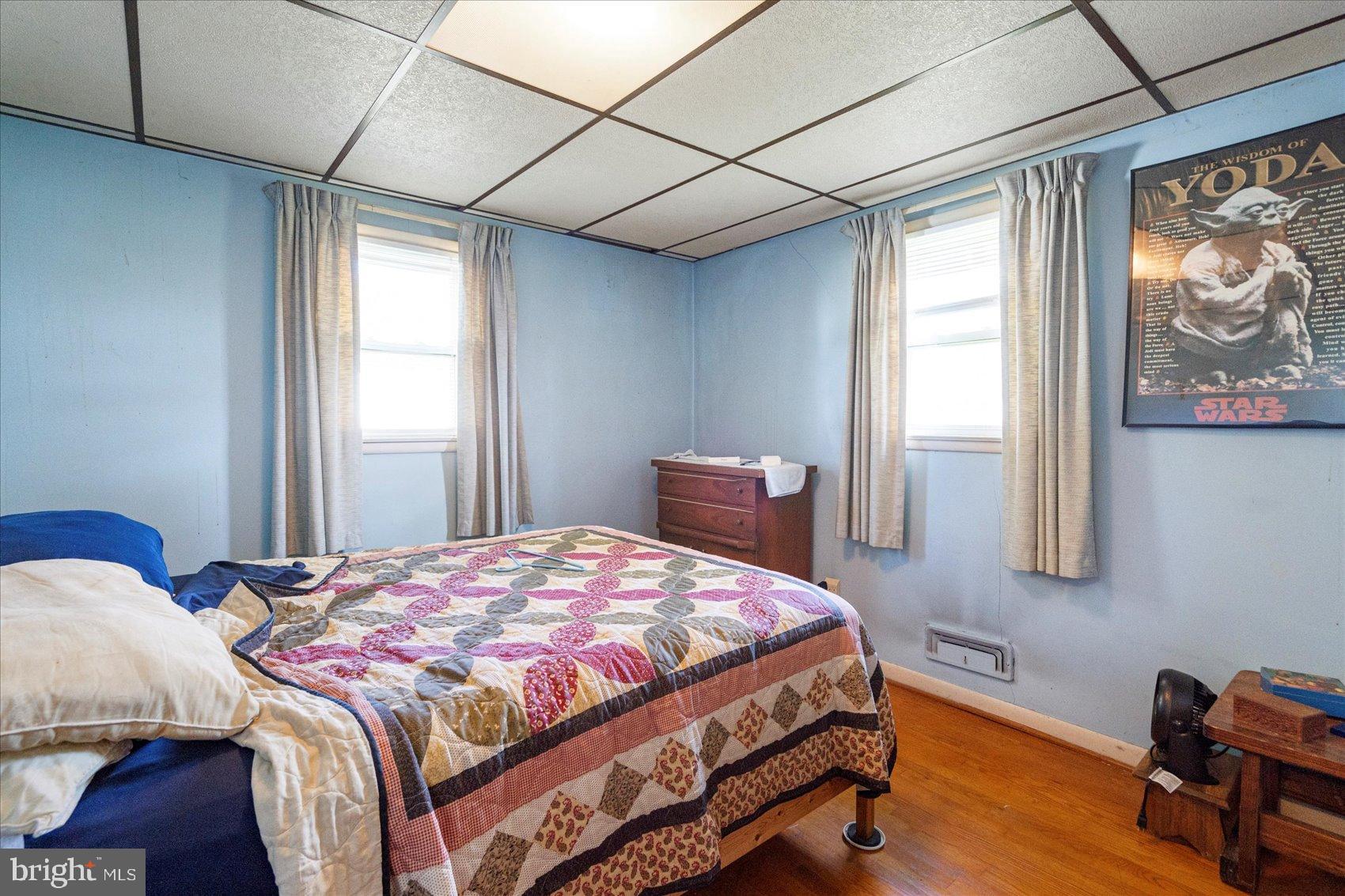 8368 Old Philadelphia Road Baltimore, MD 21237 - Photo 24 of 29 a bedroom with a bed and a window