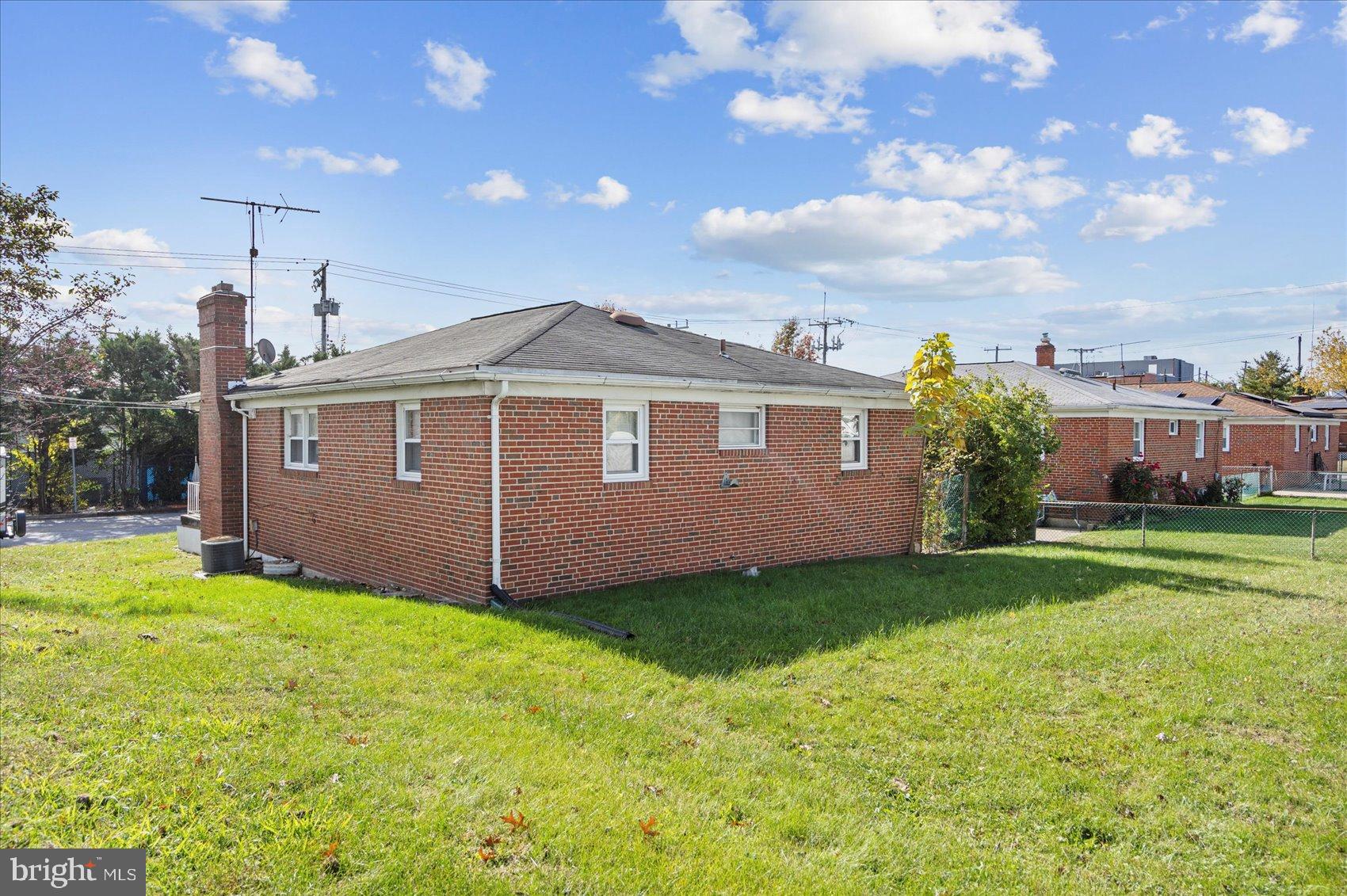 8368 Old Philadelphia Road Baltimore, MD 21237 - Photo 5 of 29 a view of a house with a yard